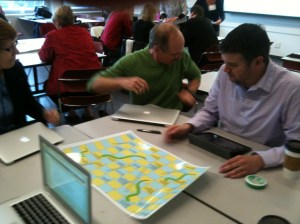 Participants playing a learning analytics game of snakes and ladders